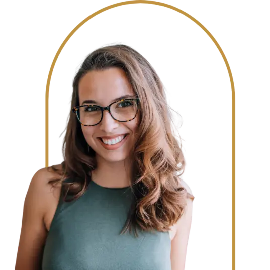 Smiling girl under golden arch